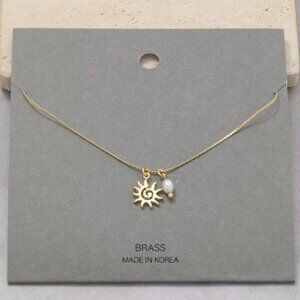 COMING SOON KENNEDY GOLD SPIRAL SUN NECKLACE